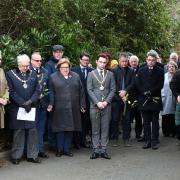 Public figures gather to pay their respects