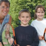COACHING: Bewdley Tennis Club coach Tracey Powell is pictured with Comberton First School pupils Cameron Pugh and Philippa Birch, both eight