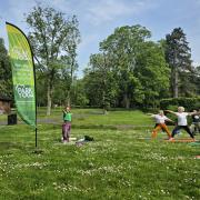 A yoga session being held at Brinton Park