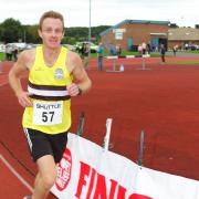 Winning run: Russell Cadwallader, of Halesowen AC, takes first place in Sunday’s 10k race. Pictures: ADRIAN HOSKINS