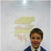 BIG BREAKFAST: Archie Luckett, eight, with his winning design.