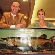 Prized catch: Andrew Beeston from Halls with Michelle Winfield and the cased pike caught by her grandfather.
