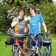 Time out: Adam Reis, left, and Tom Archer, both 20, relax after their gruelling journey.