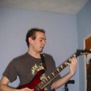 Dan Cox and his inseparable guitar
