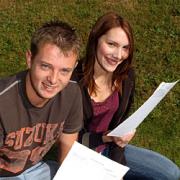 Top marks: Ben Powell and Kate Broadhurst, 18, with their results.