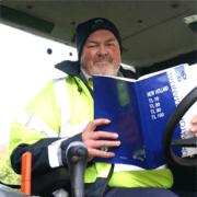David Hyde indulges in a spot of reading at work