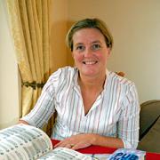 Swotting up: Sue Saunders, secretary of the athletics club, preparing for the quiz night.