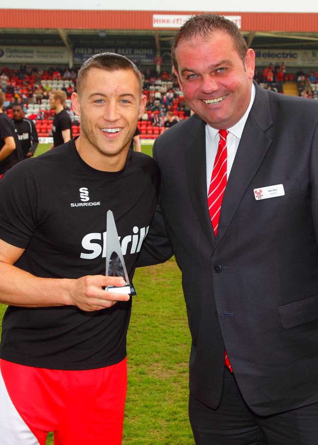 Harriers chairman Ken Rae (right) with last season's player of the year Lee Vaughan.