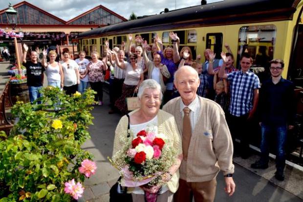 GOLDEN COUPLE: Laura and Martin Hobson welcomed 24 members of their family on a private journey along the Severn Valley Railway. Picture: Colin Hill