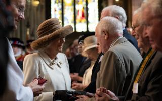 Queen Camilla hands Maundy Money to Stanley Rose of Kidderminster United Reform Church