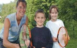 COACHING: Bewdley Tennis Club coach Tracey Powell is pictured with Comberton First School pupils Cameron Pugh and Philippa Birch, both eight