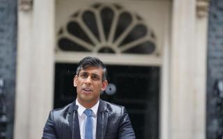 Prime Minister Rishi Sunak issues a statement outside 10 Downing Street, London