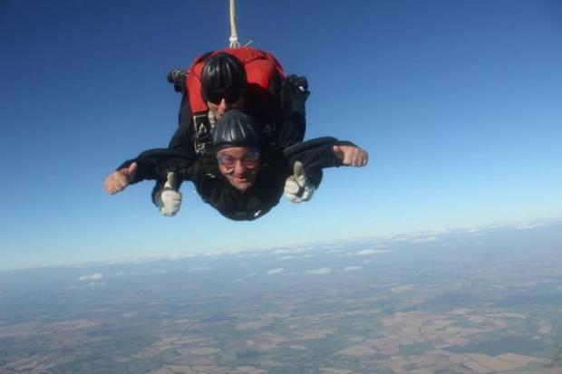 CHARITY SKYDIVE: Director Richard Bridge completing the fundraising challenge.