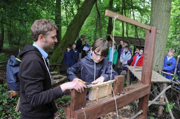 FOREST SCHOOL: Jordan Scott, school teacher, and pupil Theo Gabb, 12, during a design and technology session.